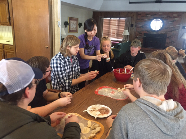 Asbury students learn to cook Chinese dumplings.