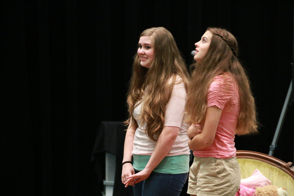 Two students acting in a skit