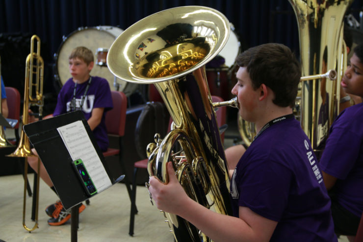 students playing brass instruments
