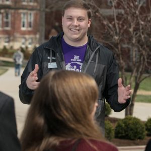 student leading a campus tour
