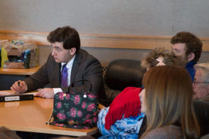 Prospective students sitting at desks