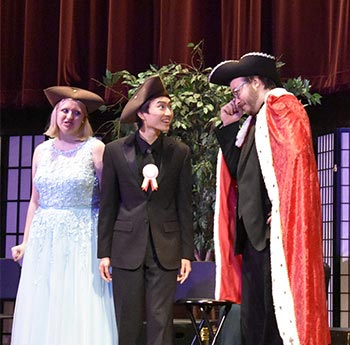 students singing in an opera performance