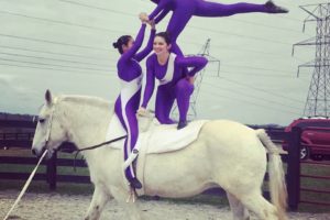 students performing vaulting