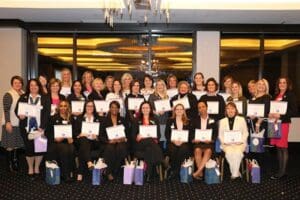 Educators posing with certificates