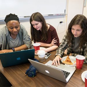 Math students gathered around laptops
