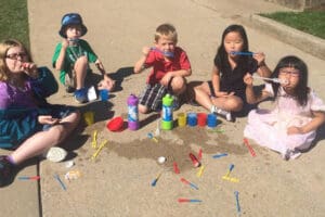 Children playing with bubbles