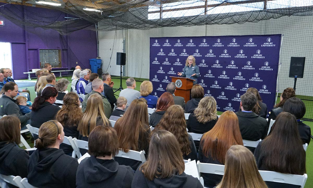 person speaking at the dedication ceremony of the Bowdoin Athletic Practice Facility