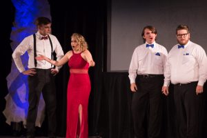 student actors on stage in Hughes