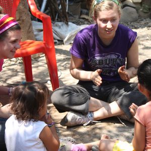 student teaching children in a foreign country