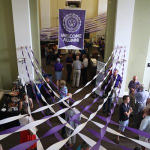 room decorated with purple and white banners and ribbons