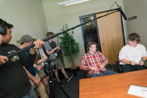 students acting in a film project