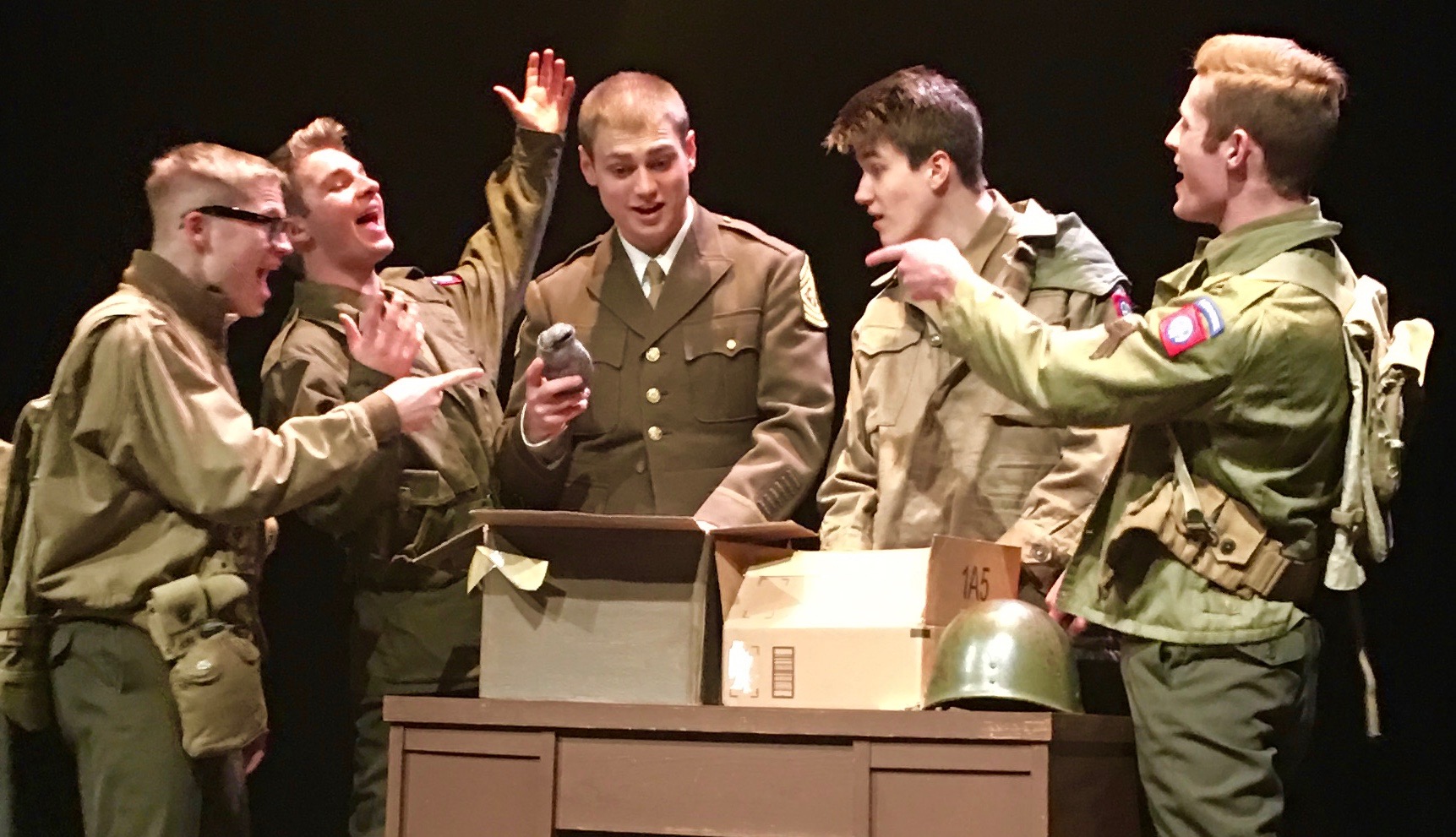students in a play as WWII soldiers