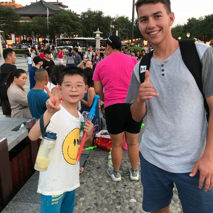 student with kid in China