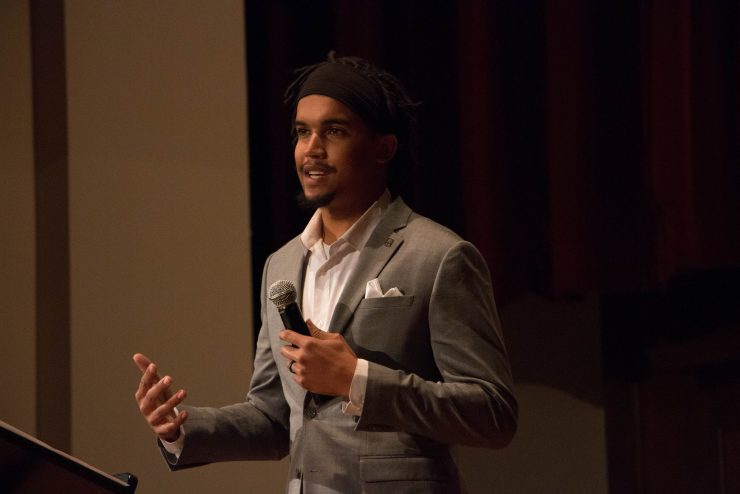 student speaking at a conference