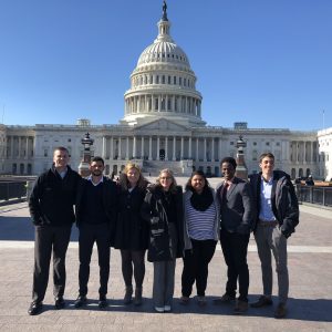 students standing in front of the U.S. capitol building