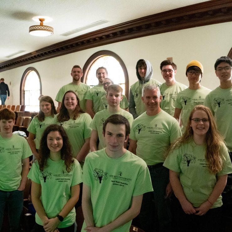 group photo of students wearing Math Modeling t-shirts