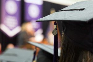 cap and mortarboard during commencement ceremony