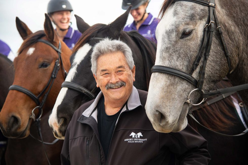 Prof. Harold Rainwater with horses and equine students