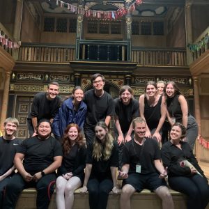 students on the Globe Theatre stage